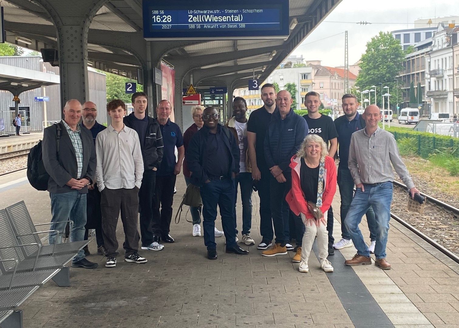MHT Technology colleagues gather at Lorrach train station as they await transport to visit Endress+Hauser campus Maulburg.