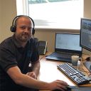 Tim Technical Support working at desk