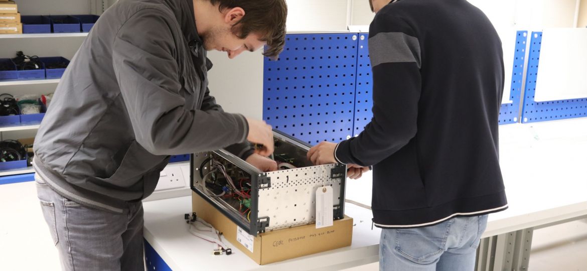 Matthew and Jake working on a Mini Receiver